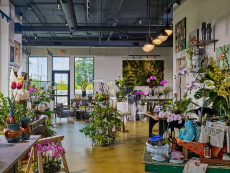 room with seating and potted plants